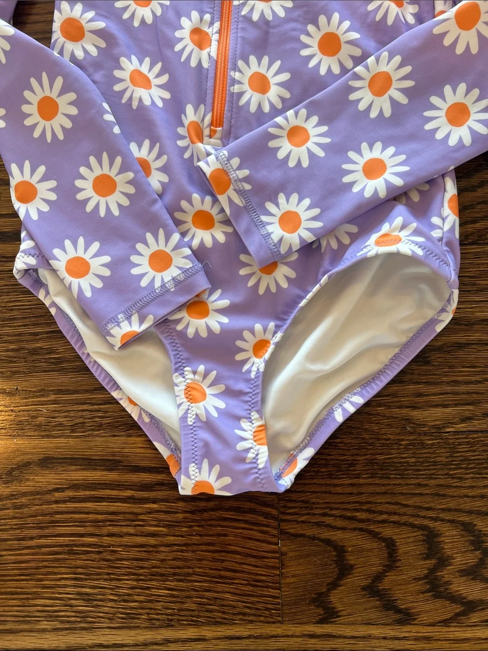Primary Purple One-Piece Bathing Suit with White & Orange Daisy Print